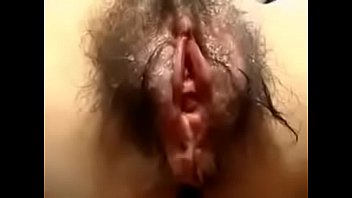Hairy Asian girl masturbations on her period